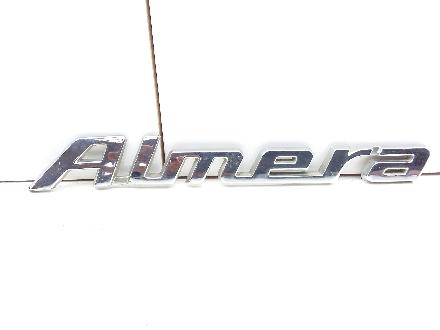 Emblem Nissan Almera Tino (V10) 90895bm400